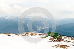 Cabin on top of the mountain in winter