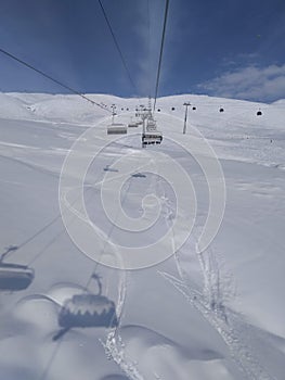 The cabines of the ski lift in  Caucasus mountains in Georgia photo