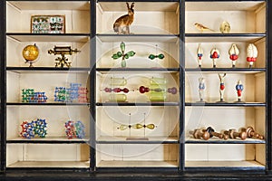 Cabinet filled with antique science objects