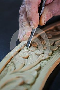 Cabinetmaker chisel on a wood photo