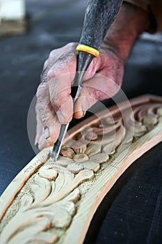 Cabinetmaker chisel on a wood photo