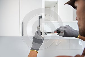 Cabinetmaker Contractor Worker Assembling Kitchen Cabinets