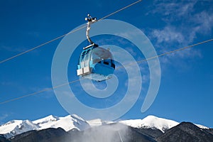 Cable car cabin and mountains view