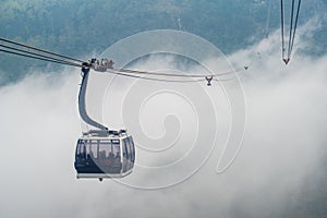 Cable car carrying passengers to Fansipan (3,143 m) mountain the highest mountains peak in Vietnam.