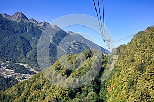 Cable car in Caucasian mountains in the vicinity of villages of Krasnaya Polyana and Estosadok. Adler District of Sochi, Russia