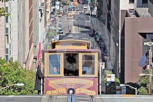 Cable car climbing hill in San Francisco