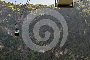 The cable car that connects Buisson with Chamois, Aosta Valley, Italy, in the summer season