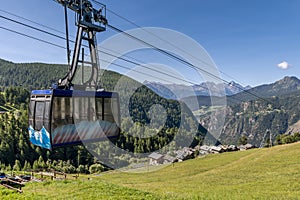 The cable car that connects Chamois with Buisson, Aosta Valley, Italy, in the summer season
