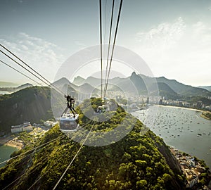 Cable car going to Sugarloaf mountain in Rio de Janeiro, Brazil photo