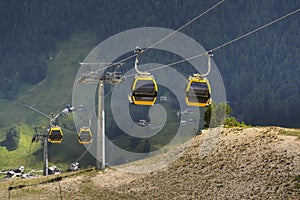 Cable car gondola in Alps mountains near Livigno lake Italy