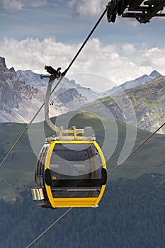 Cable car gondola in Alps mountains near Livigno lake Italy