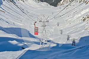 Cable car gondola ski lift. Balea Lake, Romania
