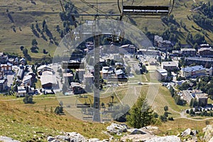 Cable car in Les deux alpes at summer time. View downhill
