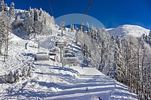 Cable car in motion on the rise and descent with people