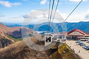 Cable car or ropeway and tourist is moving up to the top of the mountain at Akechidaira plateau in winter.