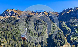 Cable car running towards Mannlichen Maennlichen from Wengen, Bernese Oberland, Switzerland