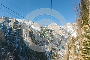 Cable car ski lift over mountain landscape