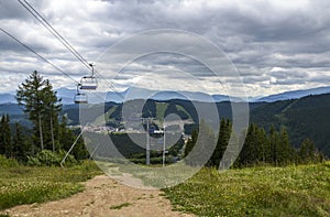 Cable car in the ski resort Bukovel and Carpathian Mountains landscape