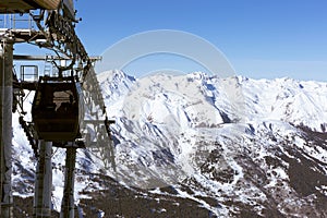 Cable car on the ski resort in France. Beautiful winter landscape and snow covered mountains