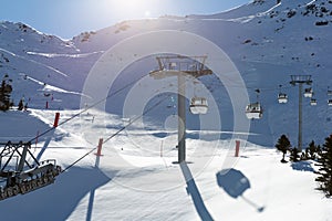 Cable car on the ski resort in France. Beautiful winter landscape and snow covered mountains