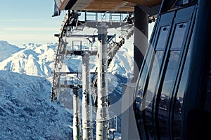 Cable car on the ski resort in France. Beautiful winter landscape and snow covered mountains