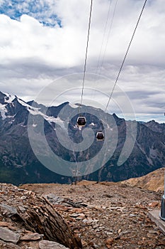 Cable Car in Swiss Alps over beautiful mountain landscape, Switzerland in Europe, beautiful ice and rock landscape