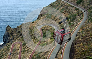 Cable Car transporting people down the cliffs of Garajau Madeira Portugal.