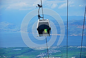 Cable cars carry people to the summit of Mount Cangshan