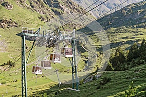 Cable cars on lift in Pyrenees Mountains