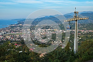 Cable cars moving above a city