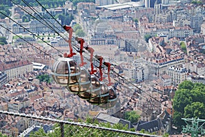 Cable cars over the city Grenoble.