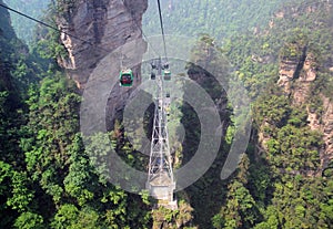 Cable cars over rock cliffs