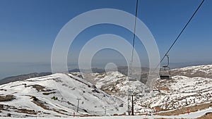 The cable cars that take skiers up and down from the top of Mount Hermon,