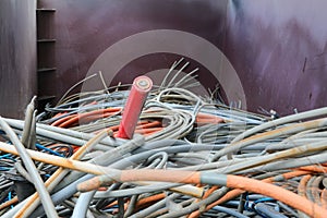 cable and electrical equipment in the recycling center for the collection of waste material photo