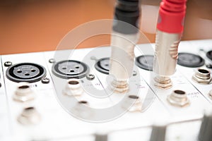 Cable input panel studio audio mixer close up