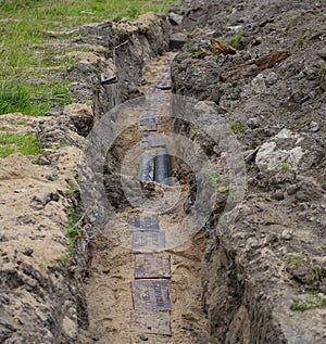 Cable laying in a dug-out ditch