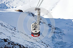 Cable lift on snowy mountain