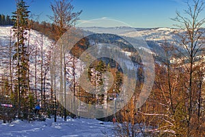Cable railway over Laliky slope on Velka Raca mountain on Kysucke Beskydy during winter
