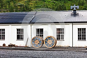 Cable reels at the white railway station