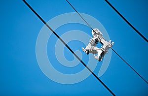 Cable Spacer on blue sky photo