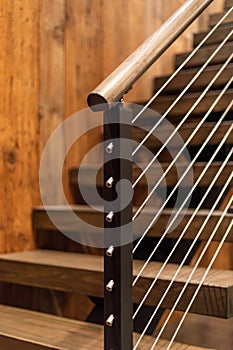 Cable Stair Railing Detail with Wood Treads photo