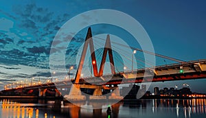 Cable-stayed bridge across the river. The bridge with night lighting in Kazan