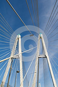 Cable stayed bridge against blue sky background