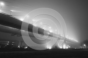 Cable-stayed bridge in Saint Petersburg. Bridge over Neva river in Saint-Petersburg, Russia. Fog night city.