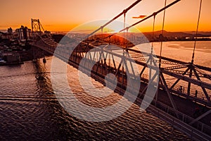 Cable stayed bridge with sunset sky in Florianopolis, Brazil. Aerial view