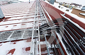 Cable tray outside with telecommunications cables, ground cables, optic fiber, power cables and transmitter data cables