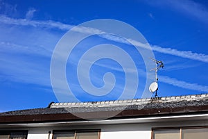 Cable TV post on roof