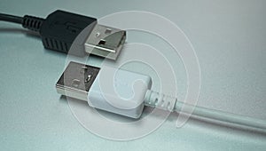 Cable USB connector, Electronic component to connection, Two USB port black and white color on grey background, Close up.