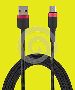 cable with USB and micro USB connector, on a yellow background