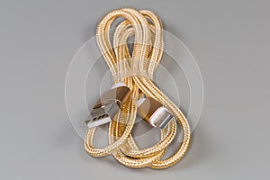 Cable USB Type-A to Type-C on gray surface close-up